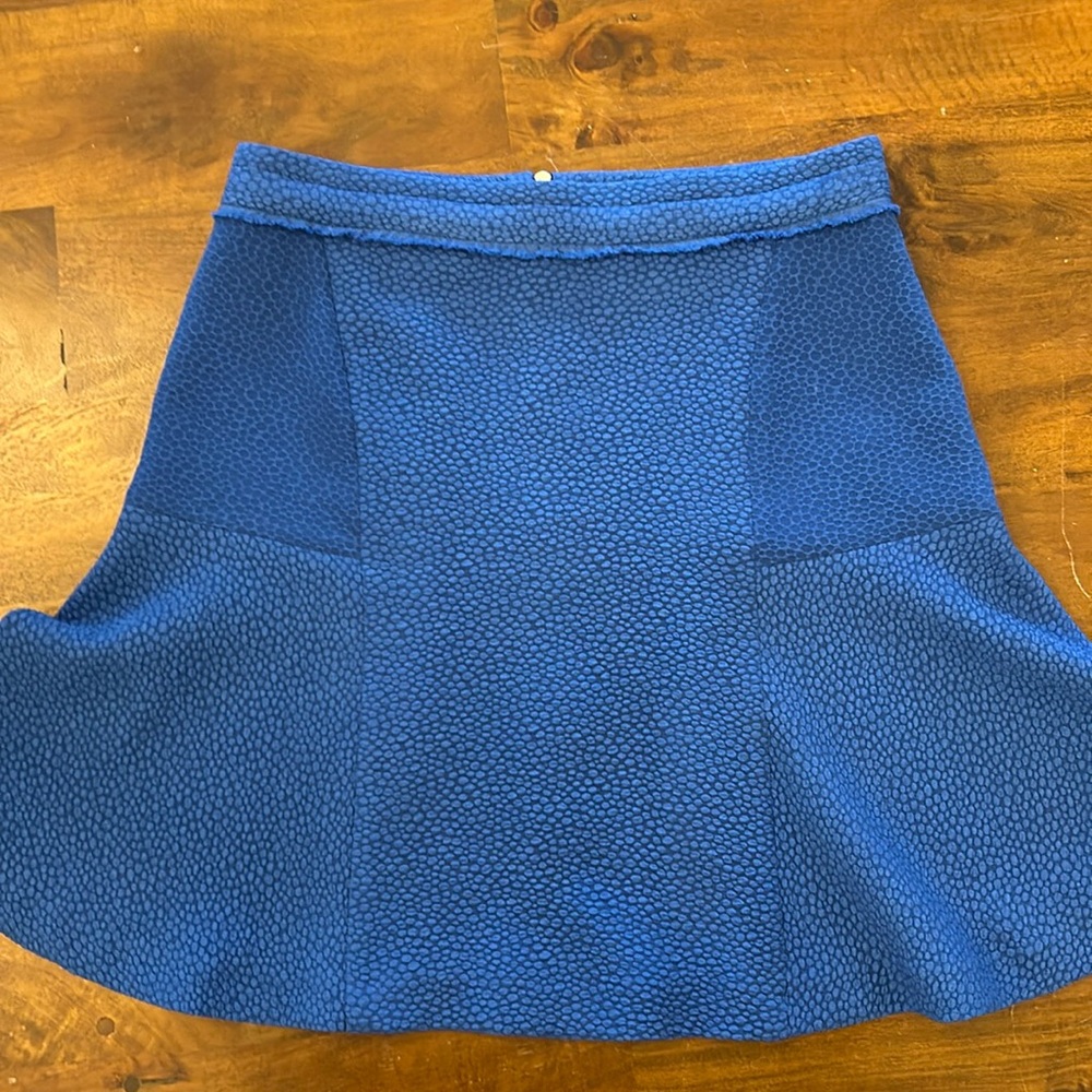 Super cute. Fit and flare skirt. With exposed zipper